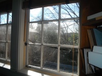 Window with weather stripping